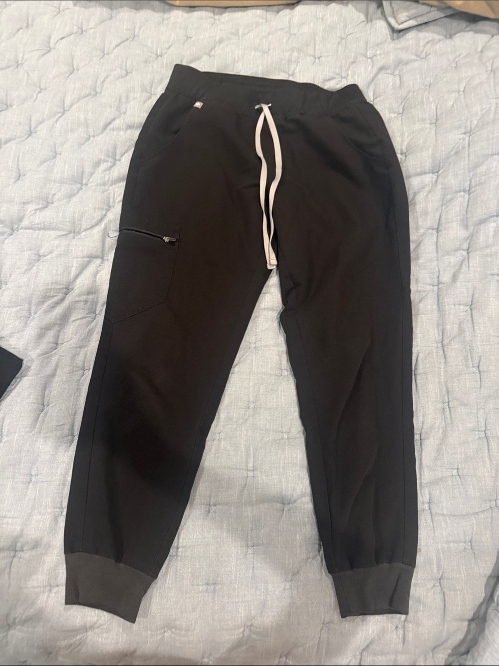 Women’s figs scrubs.